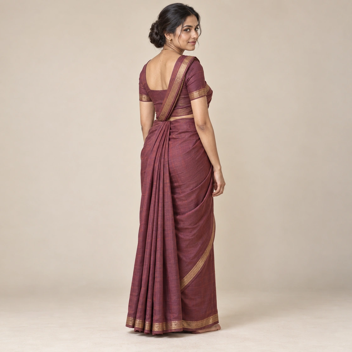 Editorial illustration of the Kodava / Coorg drape showing its characteristic arrangement
